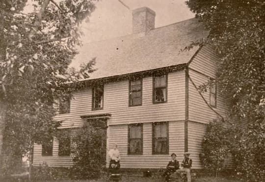 Lieut. John Hamlin's house in White Oak, Plainville, with family members seated on the front lawn