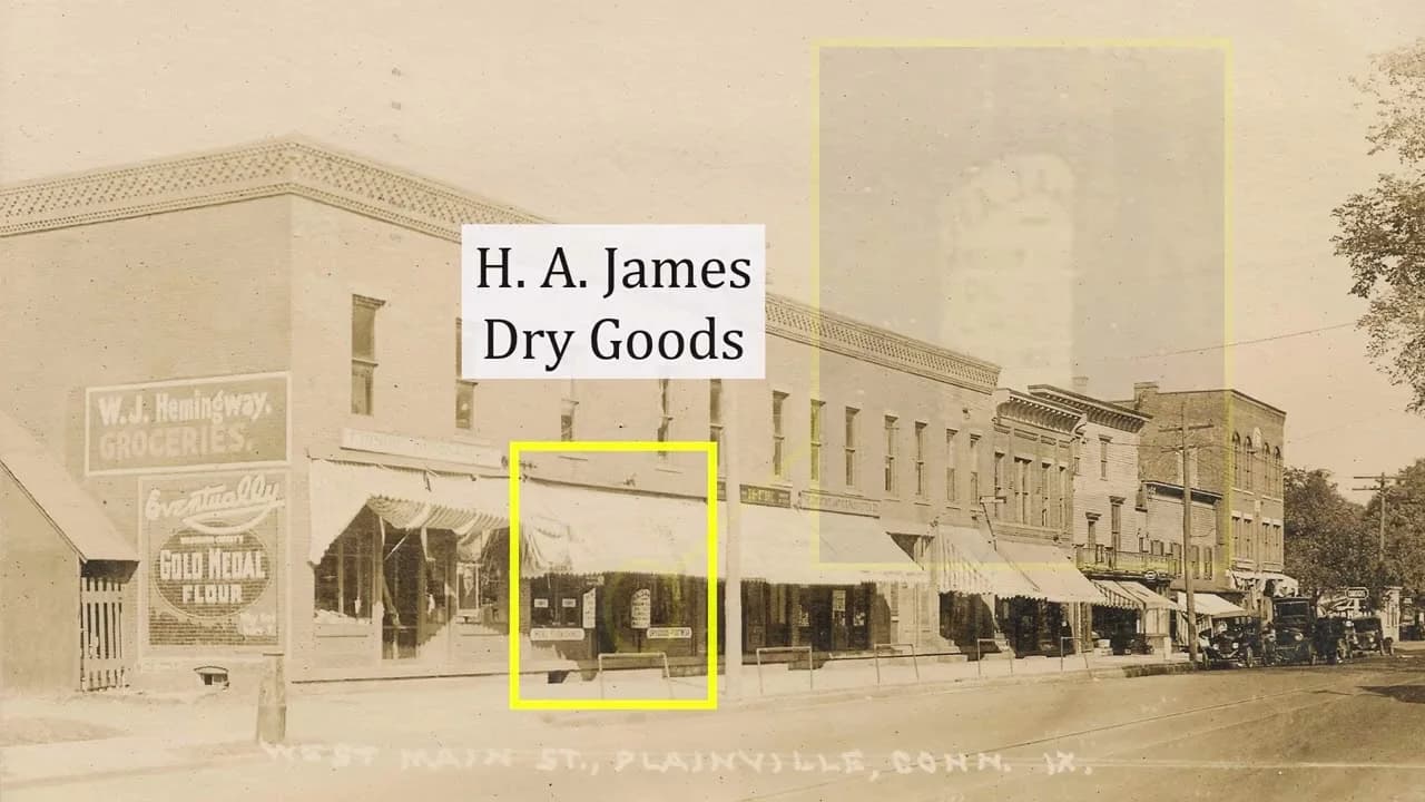 Still from the Historical Society's photo-dating video — a sepia photograph of West Main Street in Plainville, with yellow boxes marking the H. A. James Dry Goods storefront and an awning used as dating clues