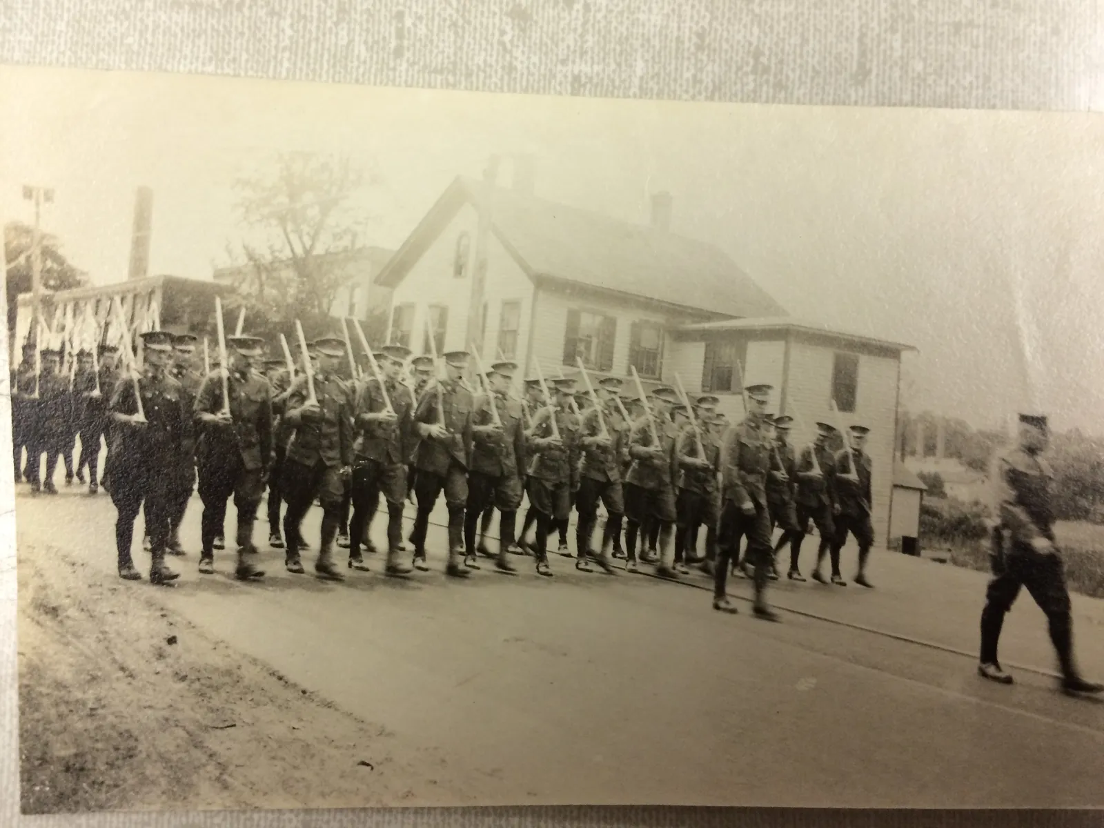 Plainville soldiers marching in formation during World War I